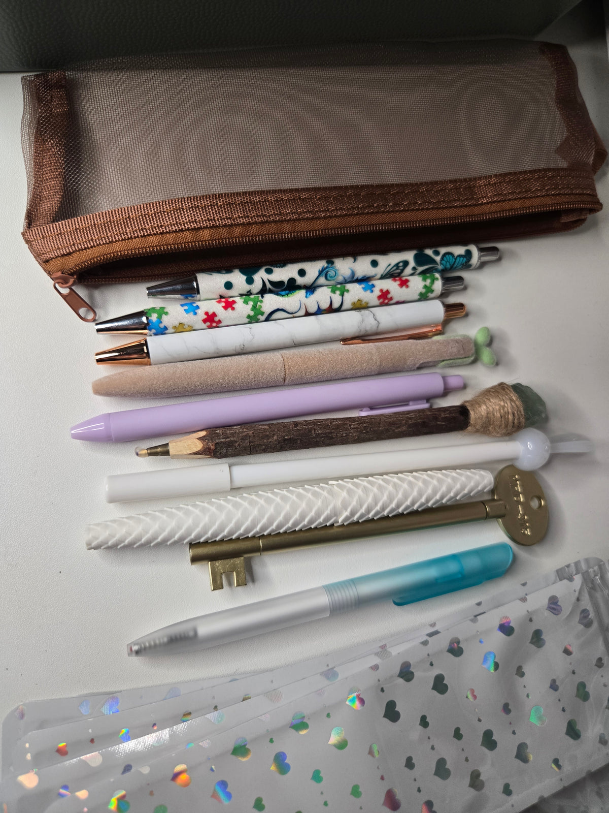 5 Mystery Pens + Pencil Case